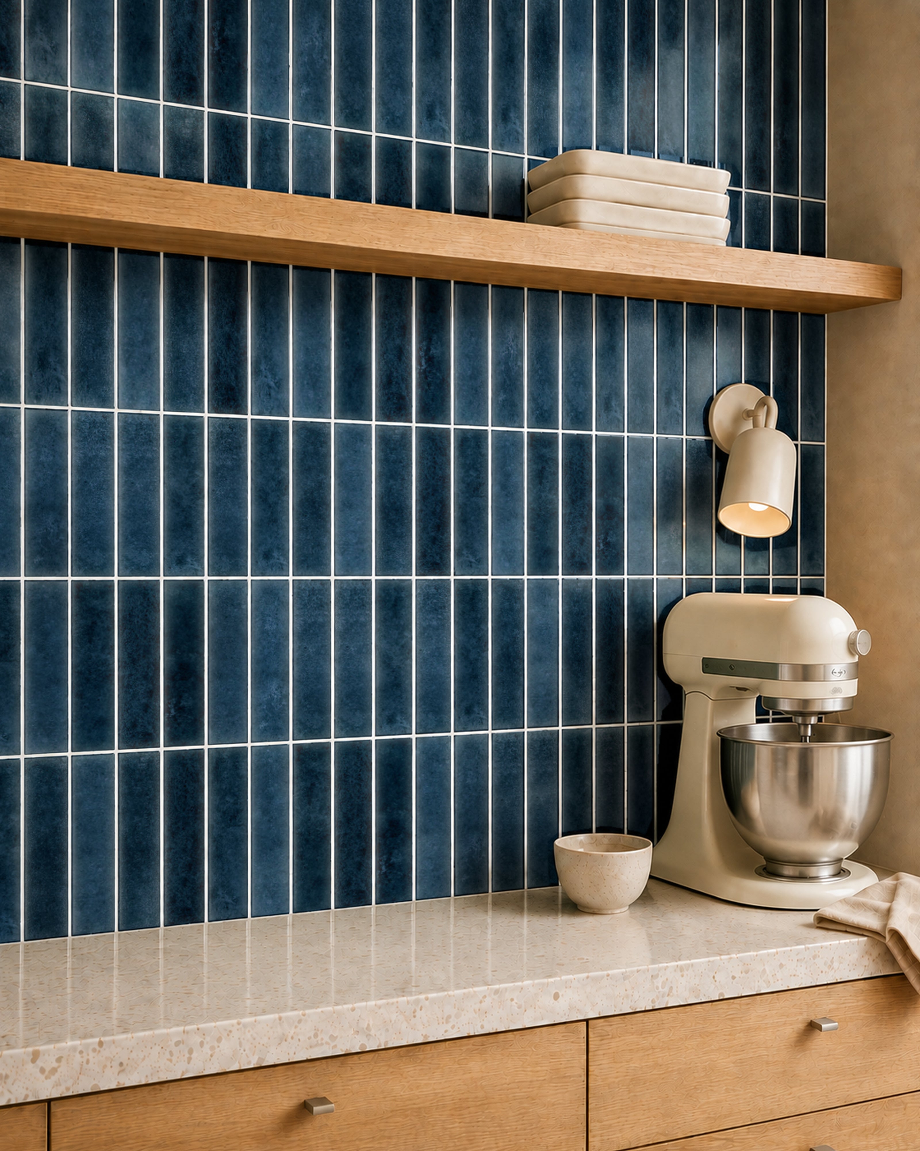 MORCART MT1386-XPE deep blue with white seams vertical linear wall tiles, oblique kitchen detail with an oak shelf and cream mixer, fine mottled print and a shallow glossy finish.