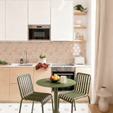 Apricot hexagon wall tiles in a light wood kitchen with a green dining table - MT2238