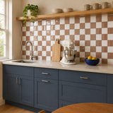 MORCART MT2420 mocha brown and white checkerboard backsplash in a kitchen with smoky blue cabinets, oblique wide view.